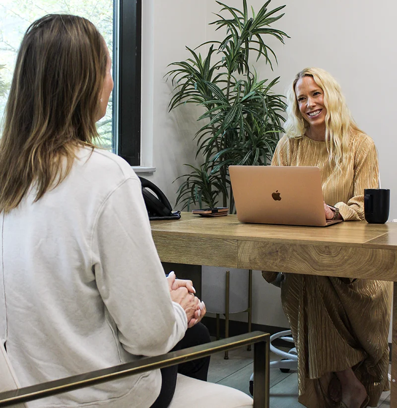 Dr. Meg with a patient during a 1:1 functional medicine consultation at YOUR.Life